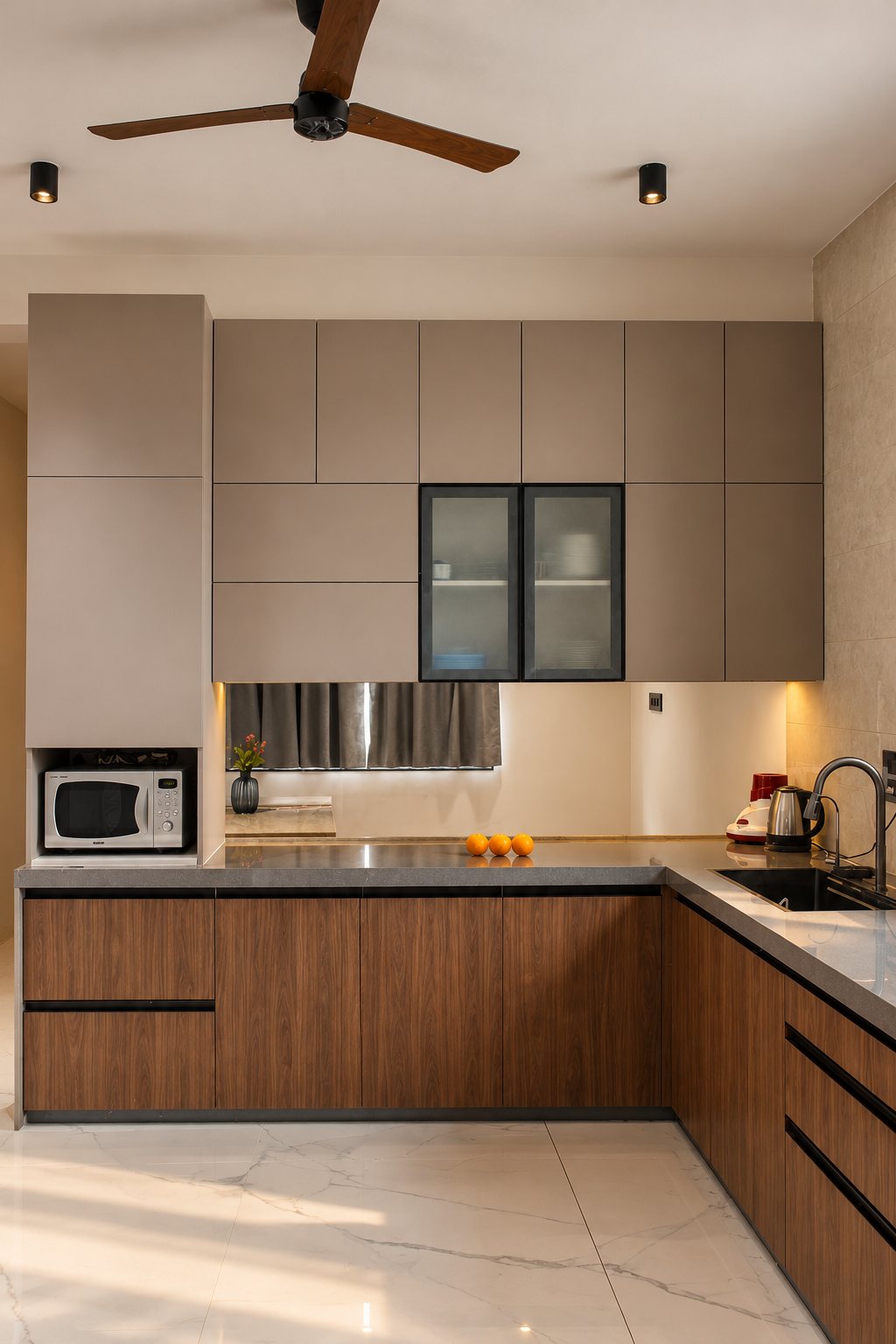 Kitchen with walnut base cabinets, taupe tall units, a fluted-glass display cabinet and a grey stone counter, photo